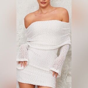 PRETTYLITTLETHING Cream Textured Bardot Flare Long Sleeve Mini Dress